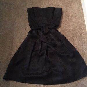 Black dress with black belt and black dots